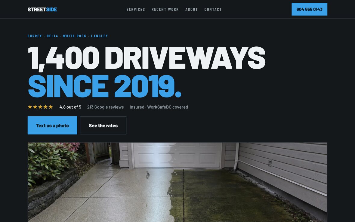 The Streetside website on a laptop: a dark page with a huge headline reading 1,400 driveways since 2019, and a driveway photo half washed clean.